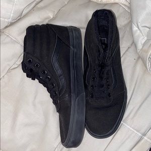 Women’s black high top Vans